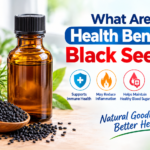 Black seed oil bottle with Nigella sativa seeds